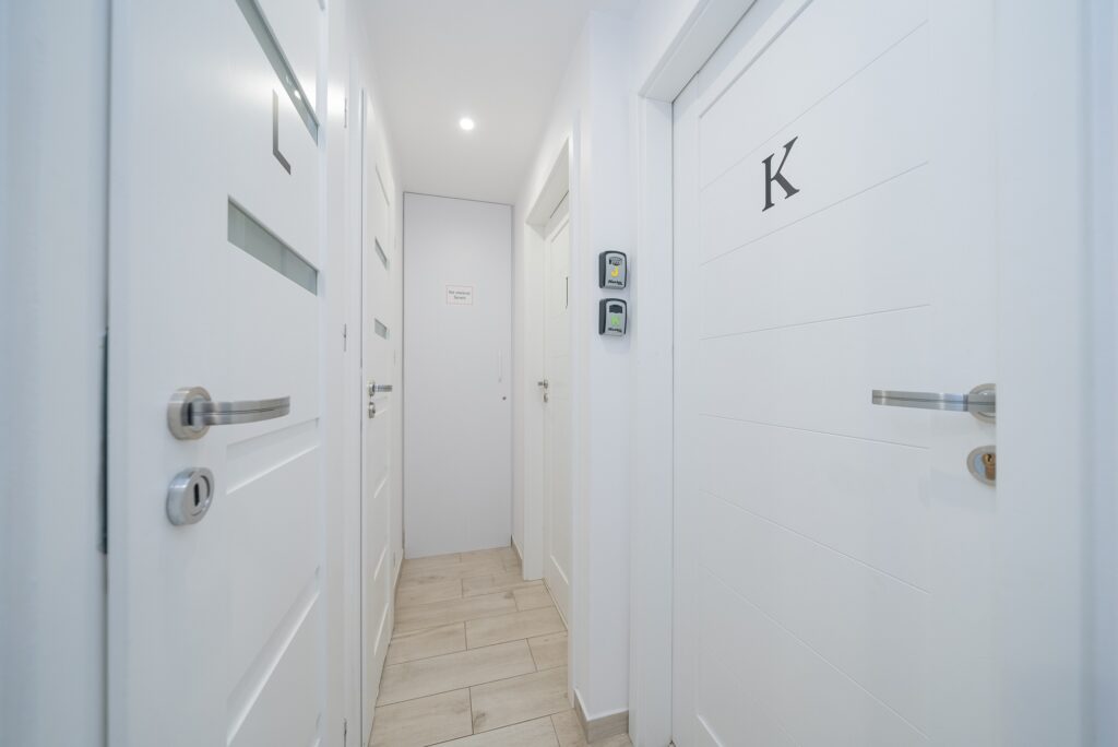 Apartment entrance in Warsaw city center with hallway and doors